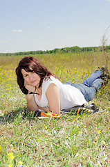 Image showing Woman resting on the grass