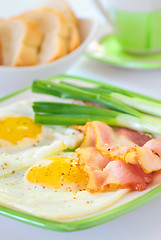 Image showing breakfast with bacon and fried eggs