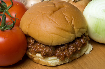 Image showing sloppy joe sandwich with tomatoes onions