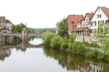 Image showing historic city in germany with river and stone bridge