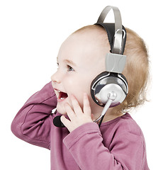 Image showing young child with headset