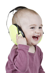 Image showing young child with ear protection