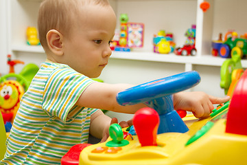 Image showing Baby Playing With The Toys