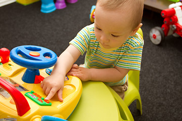 Image showing Baby Playing With The Toys