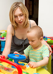 Image showing Baby And Mother Playing With The Toys