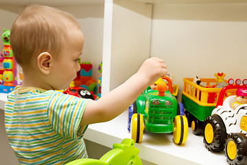 Image showing Baby Playing With The Toys