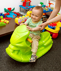 Image showing Baby And Mother Playing With The Toys