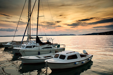 Image showing Fishing boats in Adriatic sea with sunset light