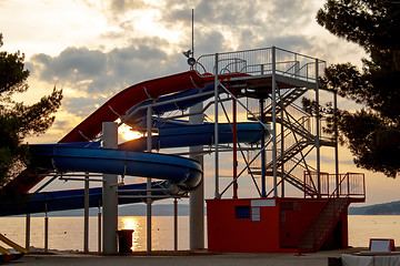 Image showing Sunset over tobbogan on beach