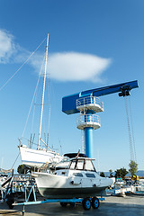 Image showing crane in yachts service and shipyard in port