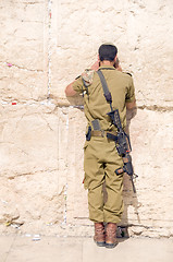 Image showing Israel military man praying The Western Wall Jerusalem Palestine