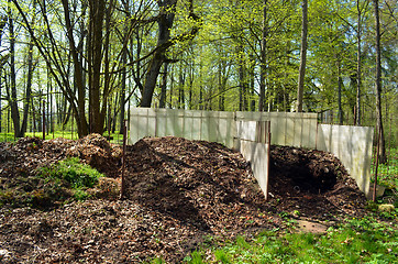 Image showing compost in garden. fertile organic waste leaves 