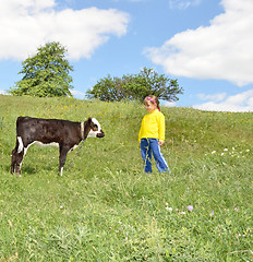 Image showing The Child and calf