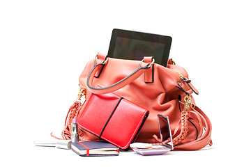 Image showing Pink Leather Ladies Handbag with Tablet PC on white background 