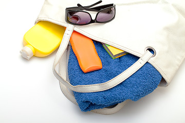 Image showing Beach Bag with Towel and Bottles Cream