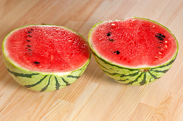 Image showing fresh watermelon on a  wood table