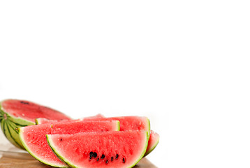 Image showing fresh watermelon on a  wood table