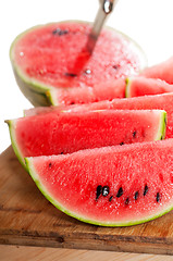 Image showing fresh watermelon on a  wood table