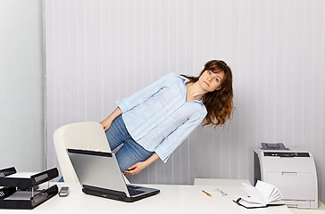 Image showing Office worker goes crazy with work