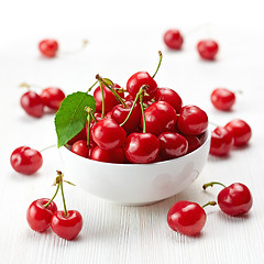 Image showing fresh red cherries in white bowl