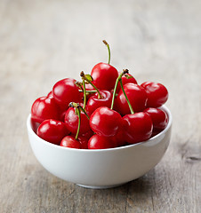 Image showing fresh red cherries in white bowl