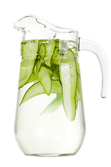Image showing refreshing water with cucumber on isolated white