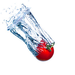 Image showing Red Tomato Falls under Water with a Splash