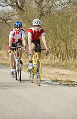Image showing Athletes Riding Cycles