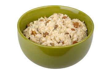 Image showing Bowl of oatmeal cereal with raisins