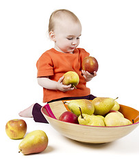 Image showing baby with apples