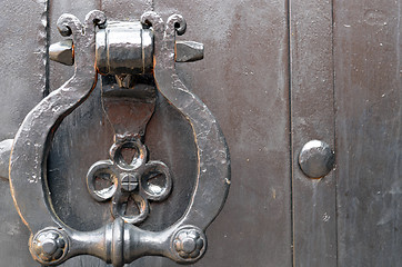 Image showing Vintage metal door handle. Ancient architecture 