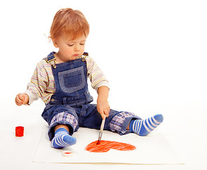 Image showing Kid paint heart on paper