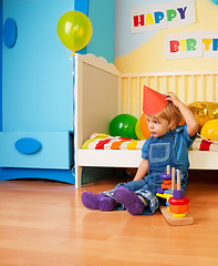 Image showing Kid after birthday party