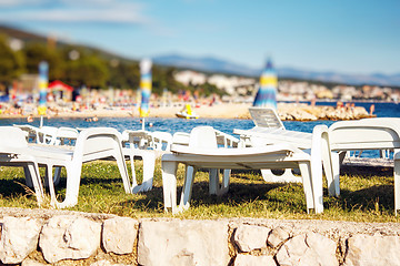 Image showing plastic Sun loungers at beach