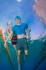 Image showing Couple swimming together