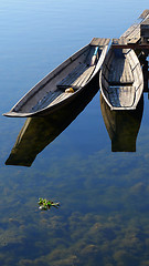 Image showing Boats with mirror in water