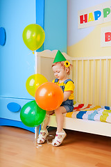 Image showing Little girl with balloons