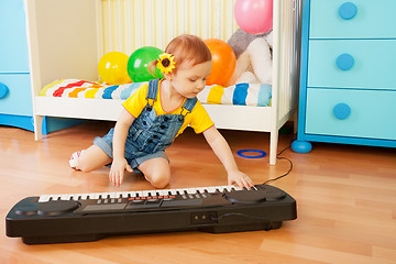 Image showing Girl playing piano