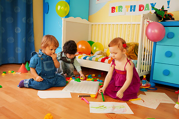 Image showing Tree kids drawing together