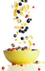 Image showing Flying to the bowl corn flakes with berries