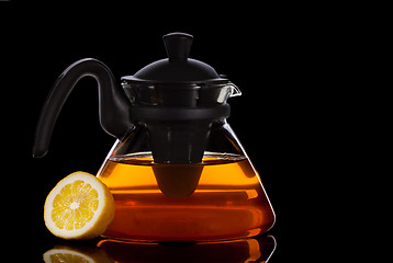 Image showing Tea in transparent glass pot