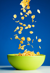 Image showing Corn flakes falling to the bowl for breakfast