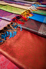 Image showing Different beautiful fabrics with fringe