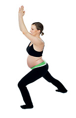 Image showing Healthy pregnant woman doing gymnastics