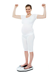 Image showing Excited pretty pregnant woman