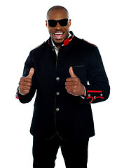 Image showing Handsome excited african with double thumbs-up