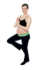Image showing Beautiful pregnant woman doing yoga