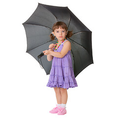 Image showing Little girl with a big black umbrella