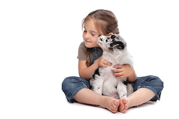 Image showing little girl and a puppy