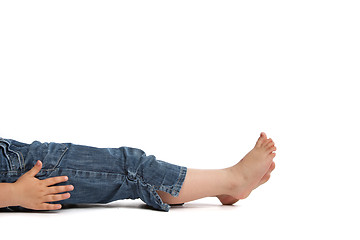 Image showing little girl lying on back